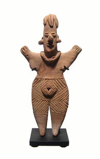 A very nice Colima standing woman upraised arms: A very nice Colima standing woman upraised arms, West Mexico, 100 BC - AD 250, with deeply incised geometric designs on her pants or perhaps representing tattoos. She wears a necklace and her