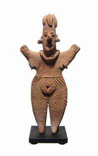 A very nice Colima standing woman upraised arms: A very nice Colima standing woman upraised arms, West Mexico, 100 BC - AD 250, with deeply incised geometric designs on her pants or perhaps representing tattoos. She wears a necklace and her features