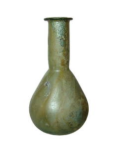 A nice Roman green glass bottle with piriform body: A nice Roman green glass bottle, c. 1st - 2nd Century AD, the piriform body with lightly indented body, the long tubular neck with wide, flat rim. The vessel is well-preserved with good color and