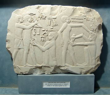 A wonderful, large framed Saqqara replica relief: A wonderful, large framed replica limestone relief from the Mastaba of Ankh-ma-Hor in Saqqara. The original dates from the reign of Teti I, 2345–2333 BC, and depicts a ritual circumcision, although