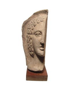 A beautiful Etruscan terracotta half head of woman: A beautiful Etruscan terracotta half head of woman, 4 Century BC, in high relief and in beautiful style, the head being in half because it was part of a relief scene mounted against a wall, the woman