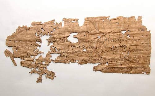 A large papyrus fragment with Greek script, Egypt: A large papyrus fragment with Greek script, Egypt, c. 3rd Century BC - 3rd Century AD, roughly triangular with several repeated sentences in a lovely cursive script with what appear to be corrections