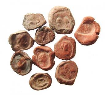 A group of 10 terracotta bullae, Roman: A group of 10 terracotta bullae, Roman, early - mid-3rd Century AD. An interesting group, all fired hard, probably from a fire in one of the eastern cities that was razed by the Sasanian king Shapur