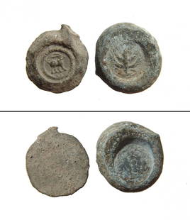 A pair of lead tokens or weights from the Holy Land: A pair of lead tokens or weights from the Holy Land. The first bears a menorah on one side and a bunch of grapes on the other, c. 5th - 10th century AD, quite thick with impressed details on either