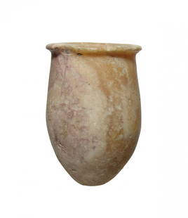 An Egyptian alabaster jar, Middle Kingdom: An Egyptian alabaster jar, Middle Kingdom, c. 2061 - 1690 BC, ovoid in shape with flattened base, the mouth slightly narrowed with wide, flat rim. The inside has been bored vertically with concentric