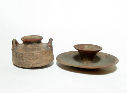 Ceramic pyxis and candle holder from the Holy Land: A ceramic pyxis and candle holder from the Holy Land. The first is a grey-ware pyxis, Late Bronze Age, c. 1400 - 1200 BC , with two vertically oriented loop handles, 3 x 4 5/8 in (7.6 x 11.7 cm), the