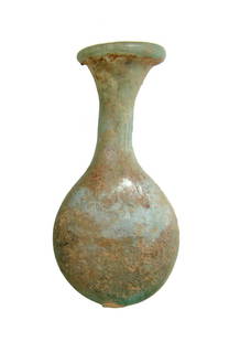 Roman pale blue glass flask, Eastern Mediterranean: A Roman pale blue glass flask, Eastern Mediterranean, 2nd - 3rd Century AD, the body round with flattened profile, the cylindrical neck with widely flared mouth and inward folded rim. H: 4 5/8 in