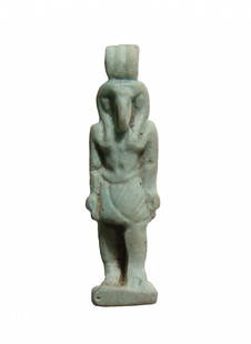 A lovely Egyptian faience amulet of the god Thoth: A lovely Egyptian faience amulet of the god Thoth, Late Period, c. 664 - 332 BC, beautifully detailed, depicted standing on integral base with back plinth, arms at side and wearing a striated kilt; su