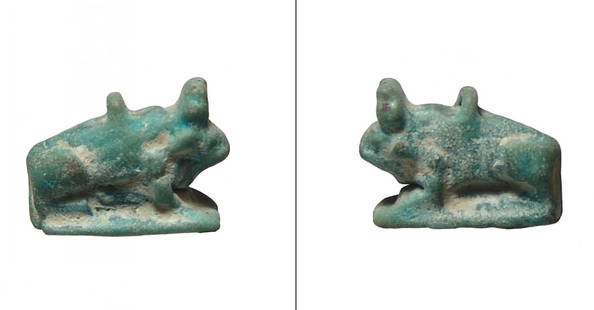 Interesting Egyptian faience amulet of the Apis Bull: An interesting Egyptian green-glazed amulet of the Apis Bull, Ptolemaic Period, c. 332 - 30 BC, on integral base with suspension loop at back. L: 17 mm. Nice green color. Ex collection of J.D.R Fryer