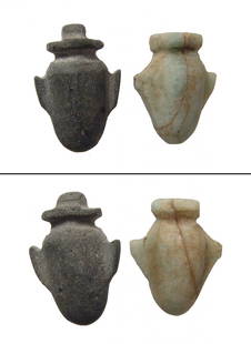 A pair of very nice stone Egyptian: A pair of very nice stone Egyptian 'ib' or heart amulets, Late Period, c. 664 - 30 BC, one in a pale-blue green feldspar (amazonite) and the other in a dark black stone. Sizes 18.5 x 16 mm & 20 x