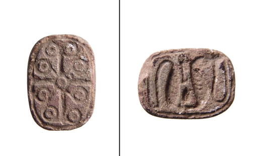 Egyptian scaraboid plaque with inscription on both: An Egyptian scaraboid plaque with inscription on both sides, New Kingdom, c. 1570 - 1075 BC, one side with drilled circles around a scrolled cruciform device and the opposing side with two stylized