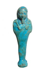 Vividly colored Egyptian faience ushabti, Dynasty 30: A vividly colored Egyptian faience ushabti, Late Period, Dynasty 30, c. 380 - 343 BC, depicted mummiform on integral base, wearing tripartite wig highlighted in a darker shade of blue with false