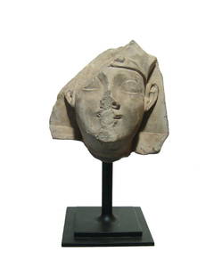 A wonderful Egyptian limestone head of a pharaoh: A wonderful Egyptian limestone head of a pharaoh, Late Period, c. 664 - 332 BC, wearing head cloth with uraeus, the features well-defined and the ears prominent. H: 5 1/8 in (13cm). Light mineral