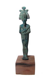 Egyptian bronze figure of Osiris, Late Period: An Egyptian bronze figure of Osiris, Late Period, c. 664 - 332 BC, depicted mummiform, wearing Atef crown with uraeus and false beard, arms folded at chest and holding a crook and flail. H: 6 3/4 in