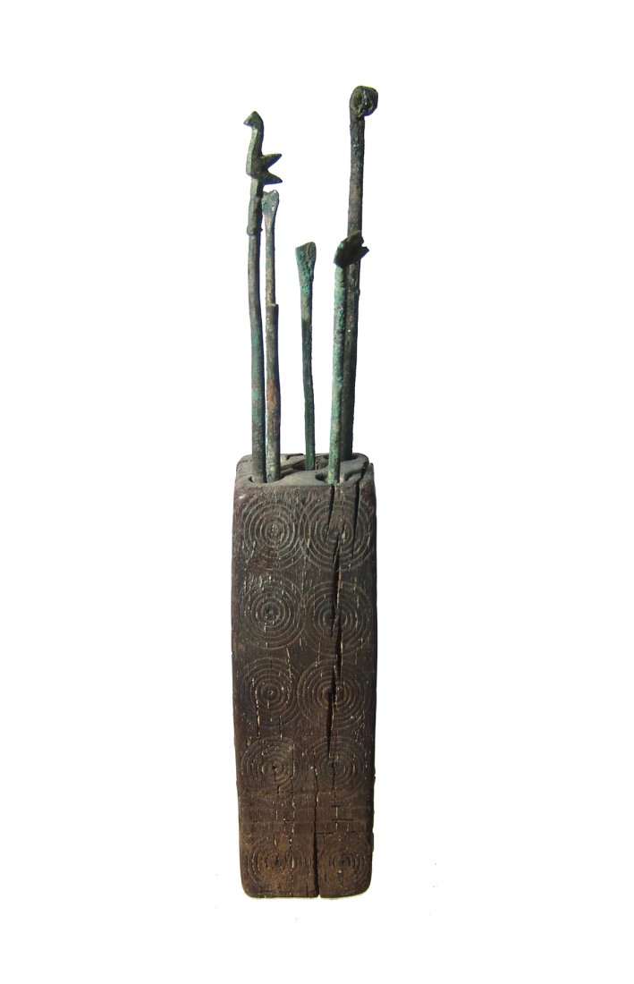 Wonderful Coptic wood block for holding implements: A wonderful Coptic wood block for holding tools and implements, Roman Egypt, c. 1st - 5th Century AD, rectangular in shape with square profile, each side decorated with ten concentric circles in two r