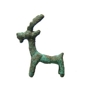 Near Eastern bronze figurine in the form of an ibex: A Near Eastern bronze figurine in the form of an ibex, c. 1000 - 700 BC, a handsome example, with narrow body, long legs, slender curved horns and large eyes. 2 1/8 x 1 3/4 in (4.4 x 5.4 cm).