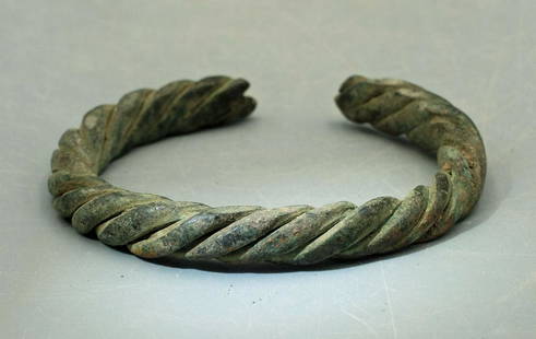 A lovely Near Eastern bronze bracelet: A lovely Near Eastern bronze bracelet, c. 800 - 200 BC. This fine braided example is 2 3/4 in (6.9 cm) in diameter and is well-preserved with good mineral deposits. Ex Clearwater, FL private