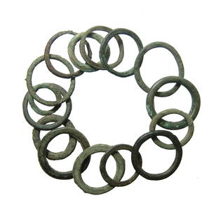 A lot of 22 bronze ring currency: A lot of 22 bronze ring currency, Western Europe, c. 3rd - 1st Century BC, of mostly a uniform size nicely patinated. Rings of this type are found in large hoards, often with silver or gold ingots