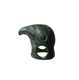 Thracian bronze eagle's head terminal or fitting: A Thracian bronze terminal or fitting in the form of an eagle's head, c. 3rd - 1st Century BC, of lovely style with slightly curved bead and large eyes, around the base are four large holes and two sm