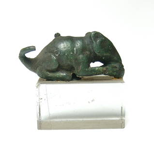 An adorable Roman bronze figure of a mouse: An adorable Roman bronze figure of a mouse, c. 1st - 3rd Century AD, depicted eating with front paws holding a bite of food, tail looped over the back. L: 1 1/2 in (3.8 cm). Beautifully patinated and