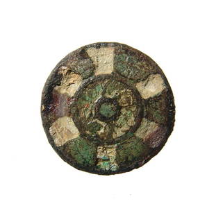 A Roman enameled bronze disk brooch: A Roman enameled bronze disk brooch, c. 2nd Century AD, the circular body with preserved white and green enamel and forms a nice rosette pattern. Dia: 25 mm. Well-preserved with original pin and catch