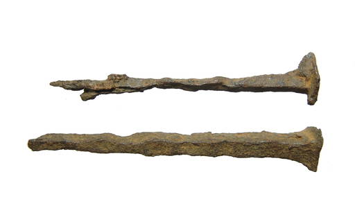 A pair of Roman iron nails, early 1st century AD: A pair of Roman iron nails, early 1st Century AD, of the type often referred to as crucifixion nails due to the size. These nails were made within 45 years of the crucifixion of Jesus Christ, which