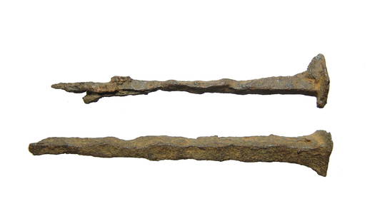 A pair of Roman iron nails, early 1st century AD: A pair of Roman iron nails, early 1st Century AD, of the type often referred to as crucifixion nails due to the size. These nails were made within 45 years of the crucifixion of Jesus Christ, which mo