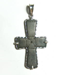 A lovely silver pendant with Byzantine bronze cross: A lovely silver pendant with Byzantine bronze cross. The cross is Byzantine, 8th - 11th Century AD, with incised decoration and attractive patination. The cross is nicely set into a custom silver