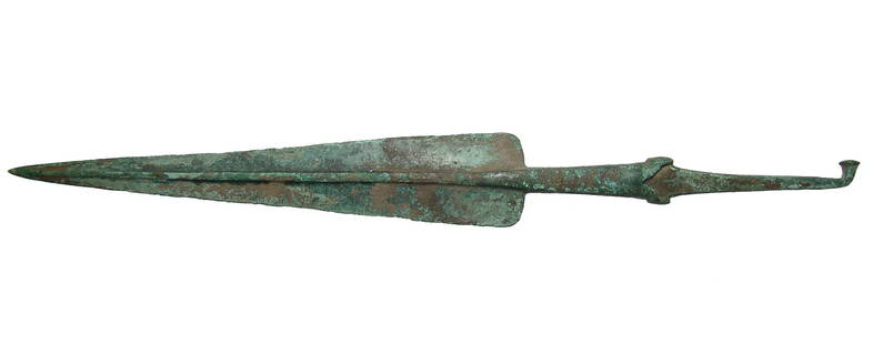 Impressive Near Eastern bronze javelin/spear head: A large and impressive Near Eastern bronze javelin/spear head, c. 1200 - 1000 BC, the blade tapers sharply with rectangular-sectioned midrib and rounded shoulder, rat-tailed tang with triangular