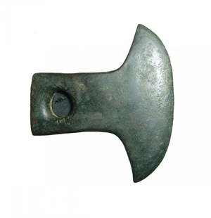 Late Bronze Age Eastern Mediterranean bronze axe: A Late Bronze Age Eastern Mediterranean bronze axe, c. 1000 BC, with crescent blade and trapezoidal butt with central hole. Possibly used as a votive, L: 4 2/3 in (11.8cm). Custom stand. Ex German
