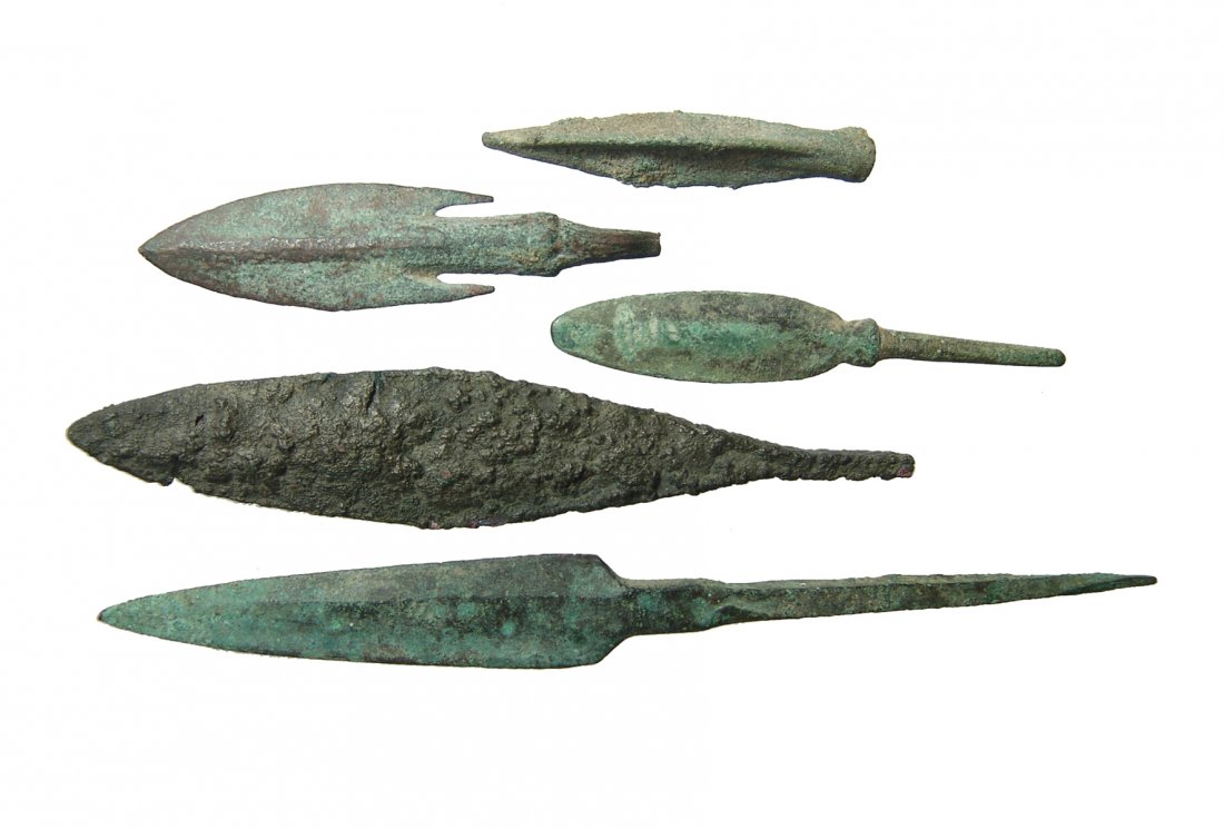 A lot of ancient bronze arrowheads and spear points (1 of 2)