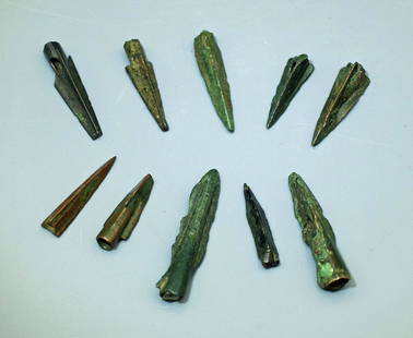 A group of 10 ancient bronze arrowheads: A group of 10 ancient bronze arrowheads, c. 1st Century BC. The group consists of Parthian and Scythian trilobate types that range from 7/8 in - 1 1/2 in (2.2cm - 3.8cm) in length, all have a nice