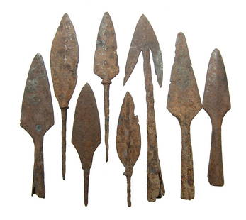 8 Chinese iron points, Liao to Qing Dynasty: A group of 8 Chinese iron points, Liao to Qing Dynasty, c. AD 916 - 1125, containing bladed examples of varying type, one with barbed shoulders. Longest 4 7/8 in (12.4 cm). Oxide patination. Ex
