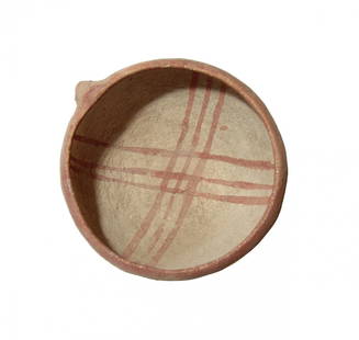 An Early Bronze Age red-line bowl, Levante: An Early Bronze Age red-line bowl, Levante, c. 3100 - 2900 BC, with rounded bottom and pierced lug handle, the entire vessel creme buff with a red line around the rim and two group of three lines