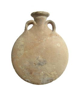 An Iron Age ceramic pilgrim's flask: An Iron Age ceramic pilgrim's flask, c. 1000 - 600 BC, with flat, circular body and a pair of strap handles flanking the flared spout. H: 6 1/2 in (16.5 cm). Surface encrustation throughout. Ex