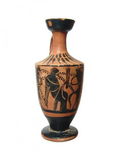 A cute little Attic black-figure lekythos: A cute little Attic black-figure lekythos, c. 6th Century BC, attributed to the Little Masters Group, c. 560 - 520 BC, with a scene involving Dionysos seated holding a torch flanked by dancing