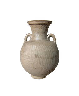 An attractive Parthian glazed terracotta jar: An attractive Parthian glazed terracotta jar, c. AD 100 - 400, the body with molded ribbing and wing patterns at the sides, the neck narrows at the base and the mouth widely flared with ridge around