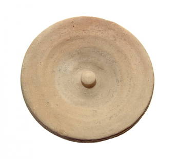 A nice Near Eastern incantation bowl: A nice Near Eastern incantation bowl, c. 5th - 7th Century AD, the walls widely flared with raised central knob, creme buff, with Aramaic spell written on the inside spiraling down towards the bottom.