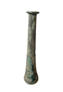 A tall Roman glass cosmetic bottle: A tall Roman glass cosmetic bottle, 1st - 2nd Century AD, in blue-green glass, the body with lightly indented bottom and the cylindrical neck narrows slightly with a wide, flat rim. A nice example