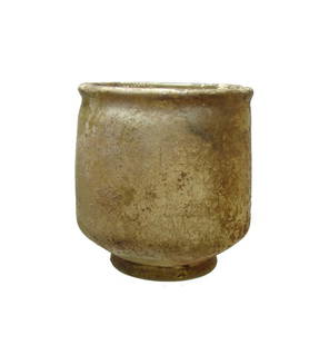 Roman yellow glass footed cup, Eastern Mediterranean: A nice Roman yellow glass footed cup, Eastern Mediterranean, 3rd - 4th Century AD, on a ring foot, the cylindrical body narrowing toward the mouth with rounded rim. A pleasing example! 3 x 2 7/8 in