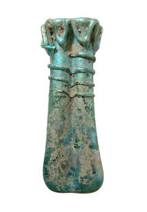 A beautiful Roman pale blue glass double unguentarium: A beautiful Roman pale blue glass double unguentarium, c. 4th - 5th Century AD, with threading around the neck and trailing around the sides of the rim. A lovely example with brilliant iridescence.
