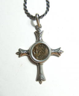Biblical Widow's Mite set into silver cross pendant: A Biblical Widow's Mite set into a silver cross pendant, Biblical Judaea, struck c. 103-76 BC, circulated during the time of Christ. The coin is a large bronze prutah set into a gorgeous custom