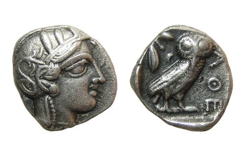 A choice Athenian silver tetradrachm, Owl of Athena: A choice Athenian silver tetradrachm. The famous Owl of Athena struck c. 454 - 404 BC, and features the helmeted head of Athena on the obverse and on the reverse an owl standing with name of city befo