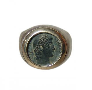 A Roman coin of Constantine I (The Great): A Roman coin of Constantine I 'the Great' set into a lovely silver and gold ring. The coin depicts the emperor Constantine I, AD 307 - 337, and is set in a nice silver ring with 14k gold bezel. Ring