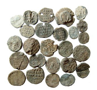 Group of 25 Roman & Byzantine lead tokens and bullae: A group of 25 Roman & Byzantine lead tokens and bullae. A nice mixed group with several in very nice condition. Ex New York private collection.