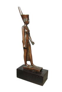 Egyptian-style replica bronze sculpture of Neith: An attractive Egyptian-style replica bronze sculpture of the goddess Neith. Of solid construction with lovely glossy patinated surfaces. Height with base 10 3/4 in (27.3 cm).