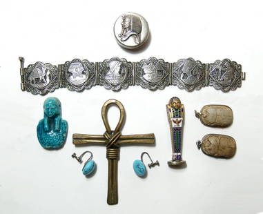 9 Egyptian themed decorative and tourist items: A lot of 9 Egyptian themed decorative and tourist items. A nice mixed group which contains a nice silver box with king Tut's mask in relief, a nice vintage open work bracelet, an enameled figure with