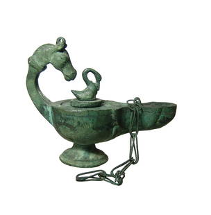 Lovely antique bronze oil lamp in Roman-style: A choice bronze oil lamp in ancient Roman style, c. 19th - early 20th Century, the rounded body with long, round-tipped nozzle, the nozzle-channel with central recessed area and circular depression
