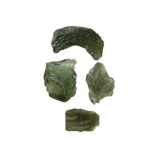 A group of 4 Moldavite tektites: A group of 4 Moldavite tektites. Formed by a meteorite impact about 15 million years ago in southern Germany which left the Nördlinger Ries impact crater. The impact splattered molten material high