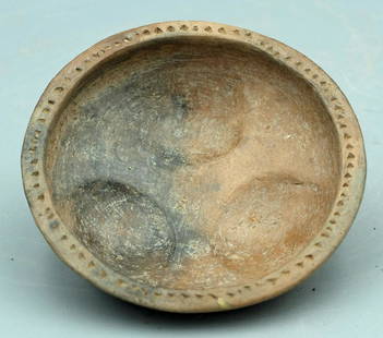A nice Chupicuaro bowl in the form of three breasts: A lovely Chupicuaro tripod dish, Mexico, c. 400 - 100 BC, finely made and stands on three mammiform legs with deep indentations in the tondo. Dia: 4 1/4 in (10.7 cm). The tan slip is highly burnished